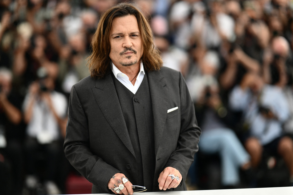 Johnny Depp dished that his rise back to the top hasn't been easy after being shunned by Hollywood over abuse claims.