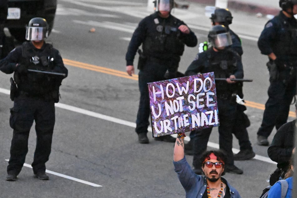 LAPD announces mass arrests as mayor issues curfew amid ongoing protests
