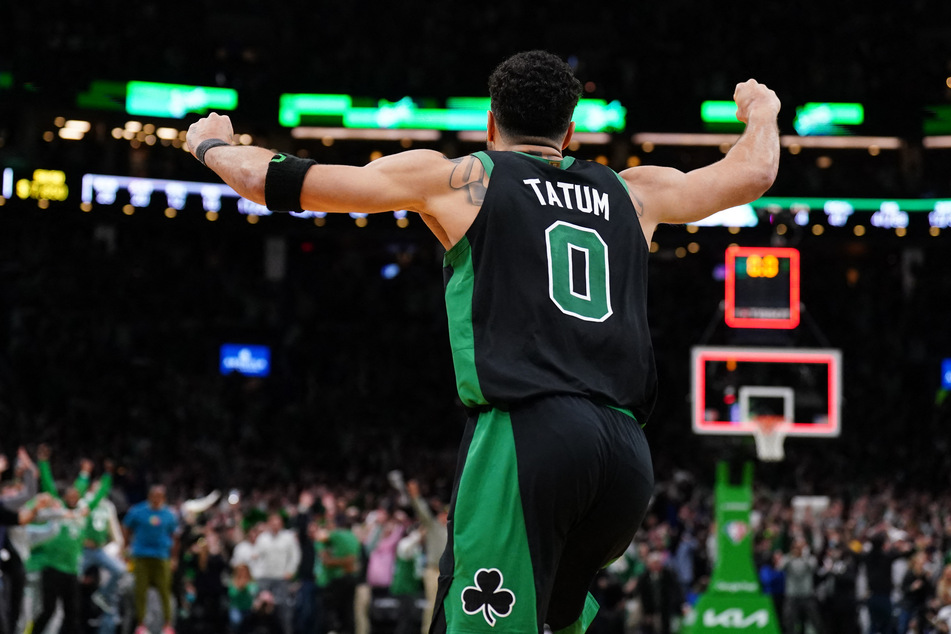 Jayson Tatum celebrates his buzzer-beating layup that gave the Celtics the win.