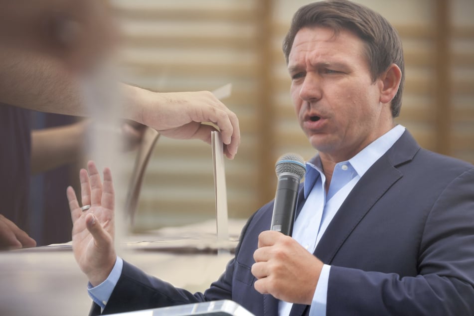 Lawsuits pour in as Florida Governor Ron DeSantis signs restrictive voting bill