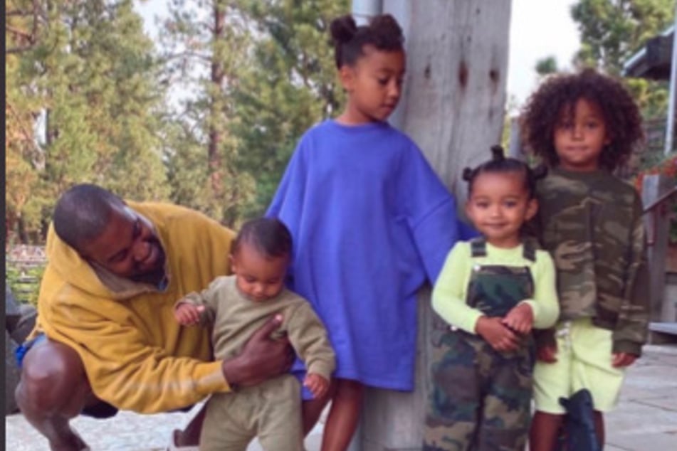 Kim Kardashian honored Kanye "Ye" West (l.) by posting various snaps of him with their four children.