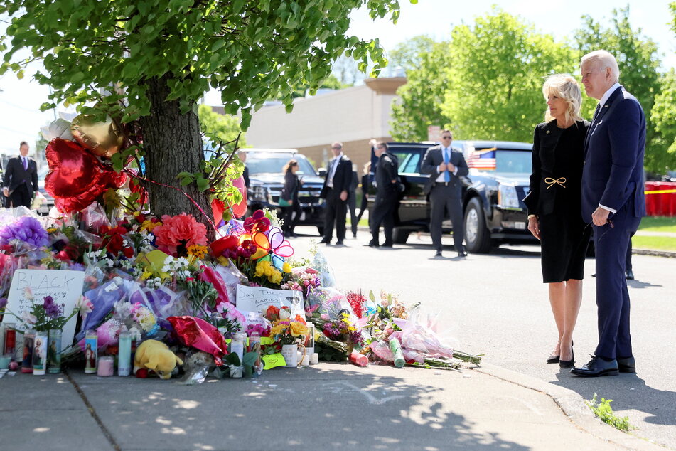 President Joe Biden and First Lady Jill Biden paid their respects to the victims killed in a mass shooting at the TOPS Friendly Markets memorial site in Buffalo on Tuesday.