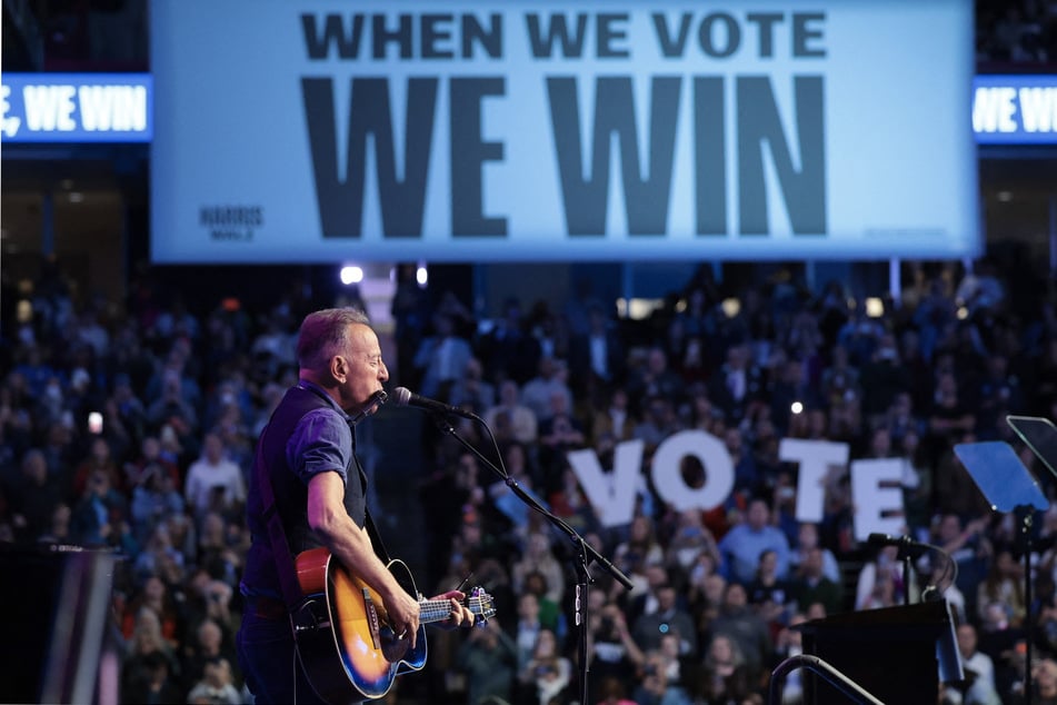Bruce Springsteen performs during a campaign rally in support of Democratic presidential nominee Kamala Harris at Temple University in Philadelphia, Pennsylvania, on October 28, 2024.
