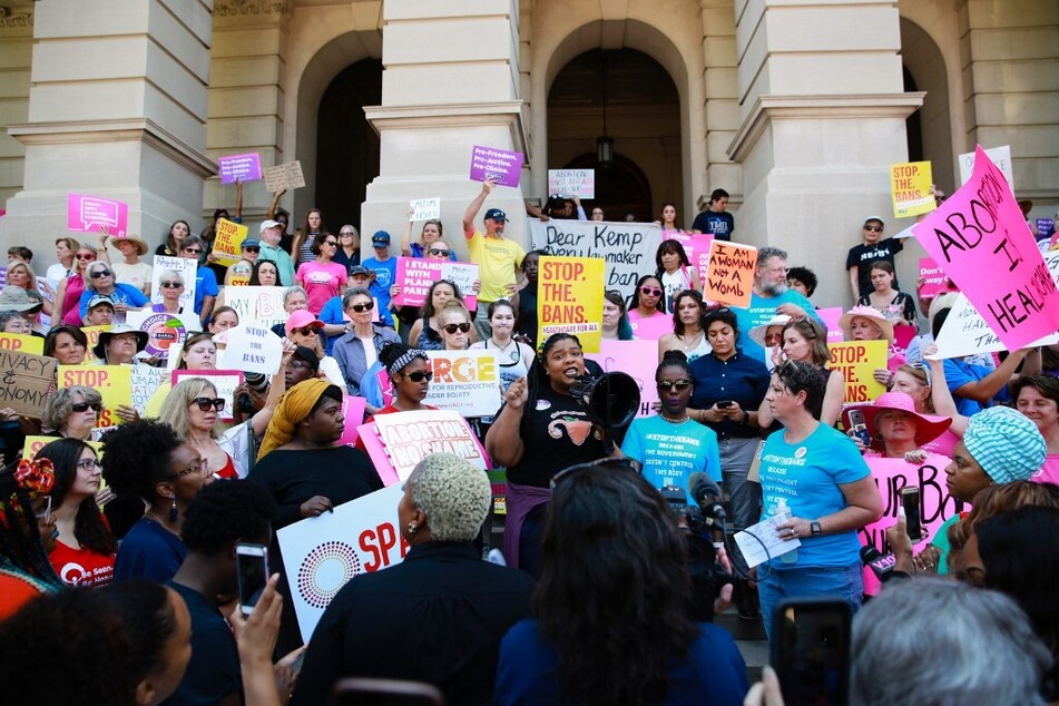 A woman speaks during a protest against abortion ban at the Georgia State Capitol building, on May 21, 2019 in Atlanta, Georgia.