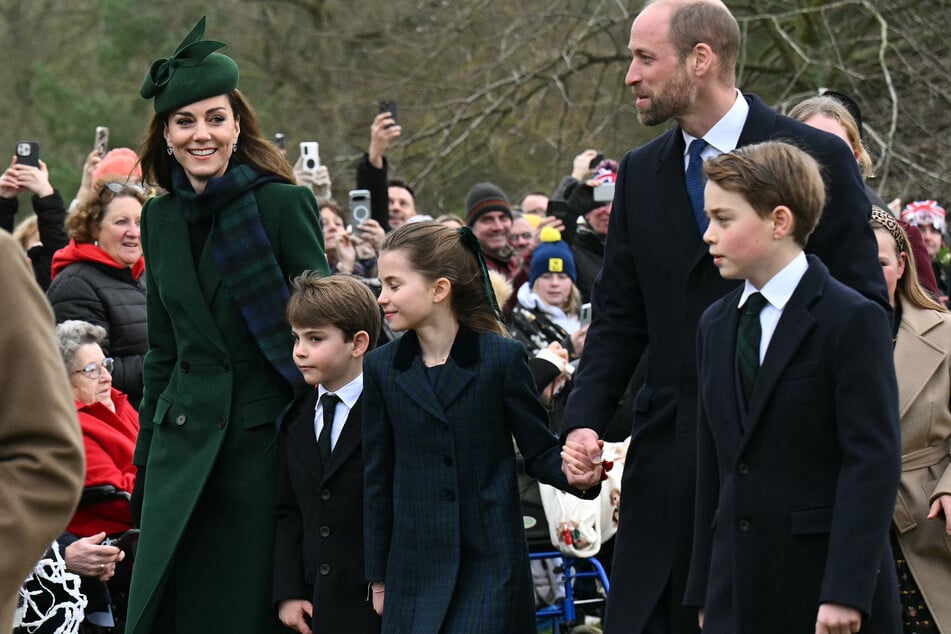 (L-R) Princess Kate, Prince Louis, Princess Charlotte, Prince William, Prince of Wales, and Prince George react upon arrival to attend the Royal Family's traditional Christmas Day service at St Mary Magdalene Church in Sandringham, Norfolk, eastern England, on December 25, 2024.