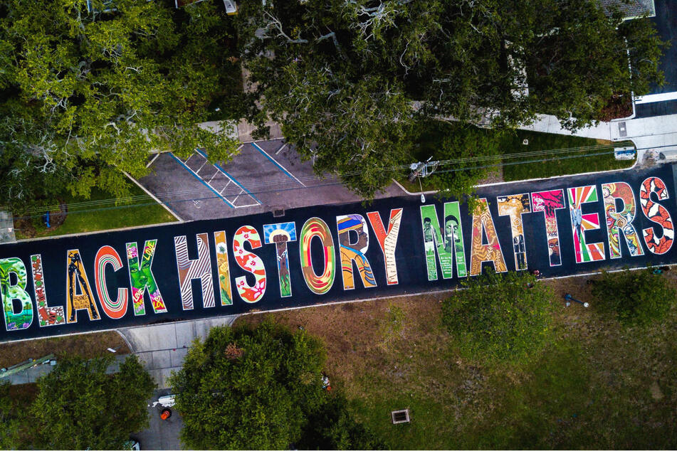 The Black History Matters mural painted on the street in front of The Woodson African American Museum in St. Petersburg, Florida.