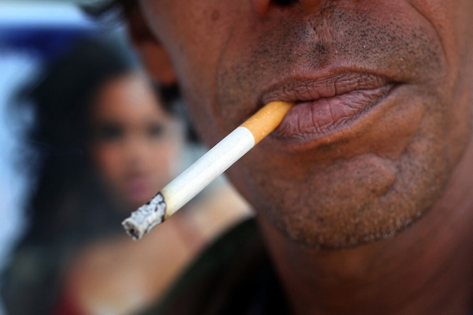 A man smokes a menthol cigarette in Miami, Florida.