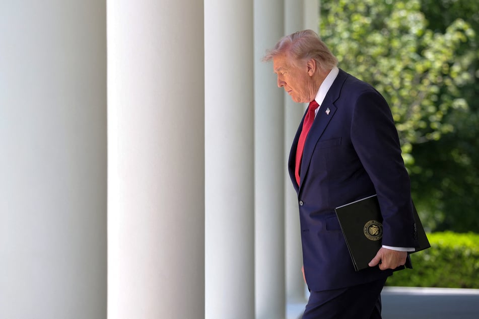 The US State Department sanctioned three Chinese companies only days before President Donald Trump is due to visit Beijing.