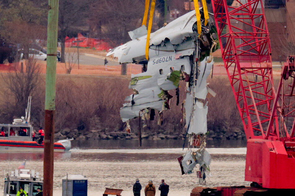 Salvage crews on Monday recovered part of the fuselage of a passenger plane that plunged into the Potomac River last week after colliding with a US Army helicopter, killing 67 people.