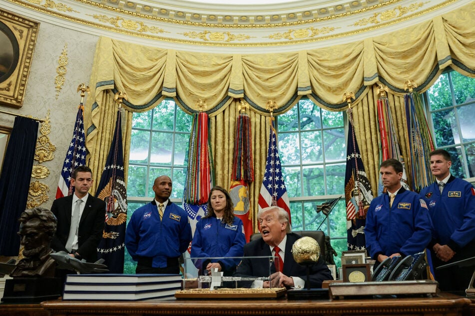 President Donald Trump joked about becoming a NASA astronaut and taking a trip to space during a White House reception for the crew of Artemis II.