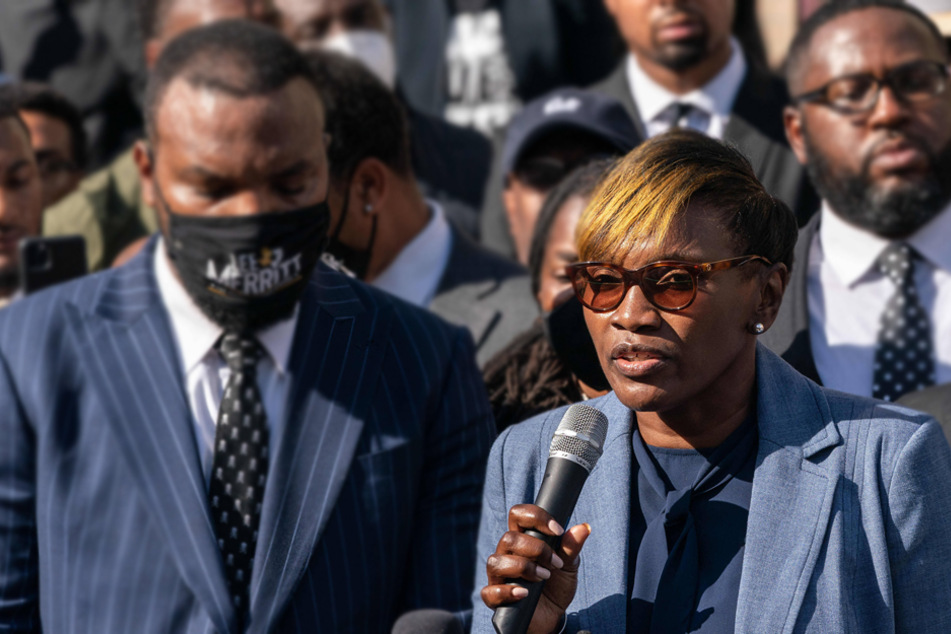 Wanda Cooper-Jones, mother of Ahmaud Arbery, center, addresses a crowd of black pastors and supporters gathered outside the Glynn County Courthouse on November 18.