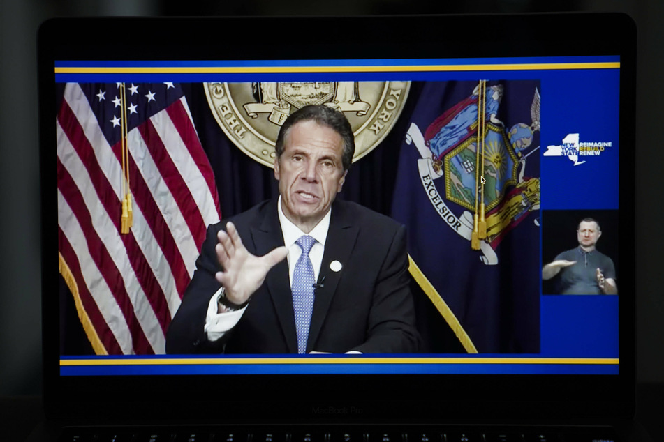 Andrew Cuomo announcing his resignation amid mounting pressures from sexual harassment allegations and investigations.