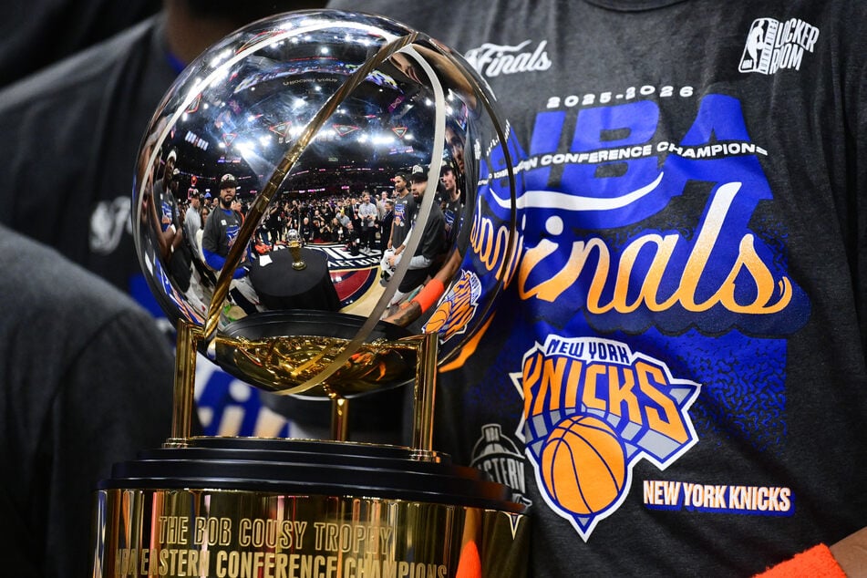 The New York Knicks are presented with the Eastern Conference trophy after defeating the Cleveland Cavaliers in game four at Rocket Arena on May 25, 2026.