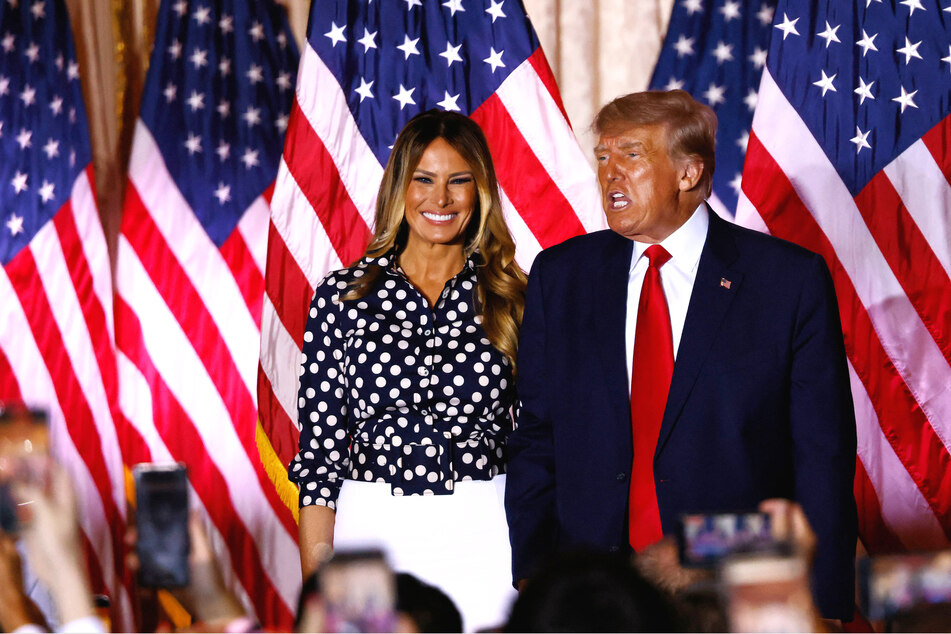 A new expense filing from a Donald Trump super PAC shows a 2021 payment to his wife Melania (l.) for a "speaking engagement," which has come under scrutiny.