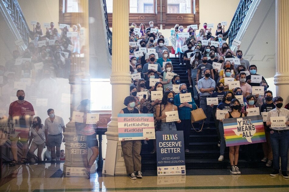 LGBTQ+ rights supporters gather at the Texas State Capitol to protest Republican-sponsored anti-trans legislation.