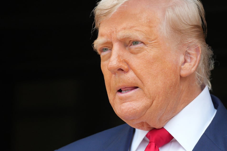 President Donald Trump speaks with the media before a bilateral meeting with Britain's Prime Minister Keir Starme in southwest Scotland on July 28, 2025.