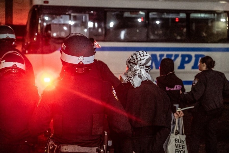 Members of the NYPD detain Palestine solidarity protesters who had occupied Columbia University's Hamilton Hall, which they dubbed Hind's Hall.