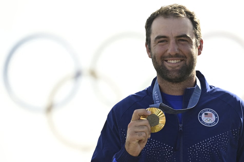 Scottie Scheffler wins men's golf gold for triumphant Olympic debut