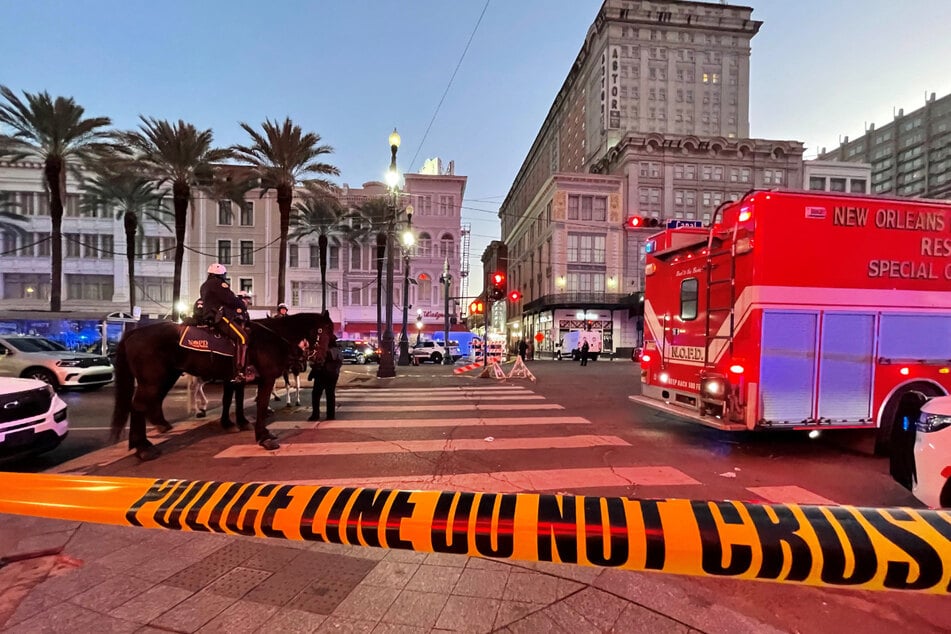 At least 10 killed and dozens injured as car plows into New Year's crowds in New Orleans