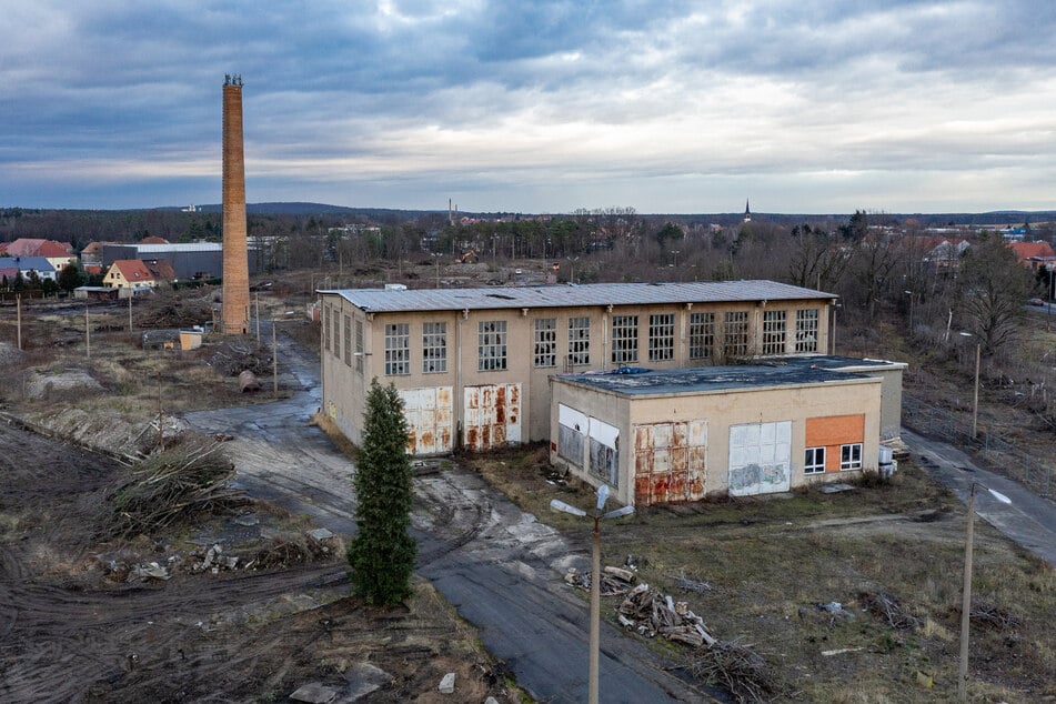 Noch ist nicht viel von einer neuen Ortsmitte zu erkennen. Doch hier auf dem Gelände des alten Betonwerks soll sie entstehen.