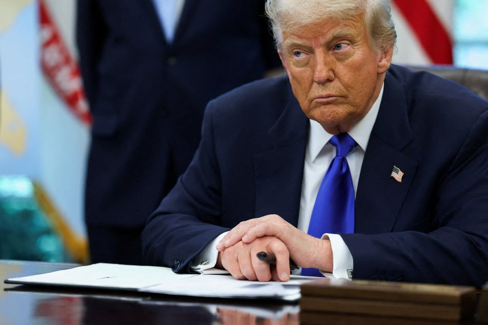 Trump orders curb on virus research as he goes all in on Covid lab leak theory