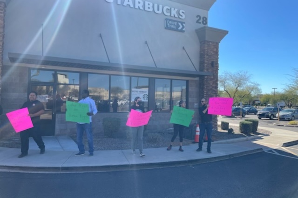 Starbucks workers in Phoenix rally outside the Scottsdale and Mayo store.