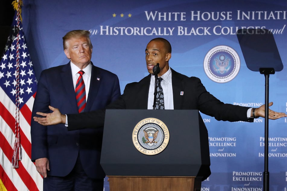 White House Opportunity and Revitalization Council Executive Director Scott Turner (r.) speaks at the invitation of US President Donald Trump (l.) during the National Historically Black Colleges and Universities Week Conference at the Renaissance Hotel on September 10, 2019 in Washington, DC.