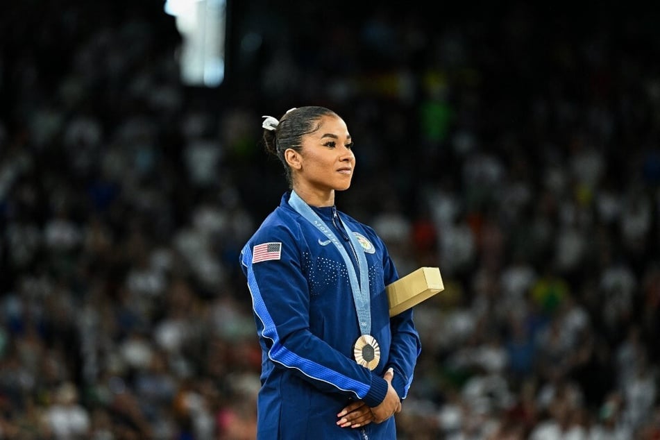 Jordan Chiles poses with the bronze medal during the podium ceremony for the artistic gymnastics women's floor exercise event of the 2024 Paris Olympic Games.