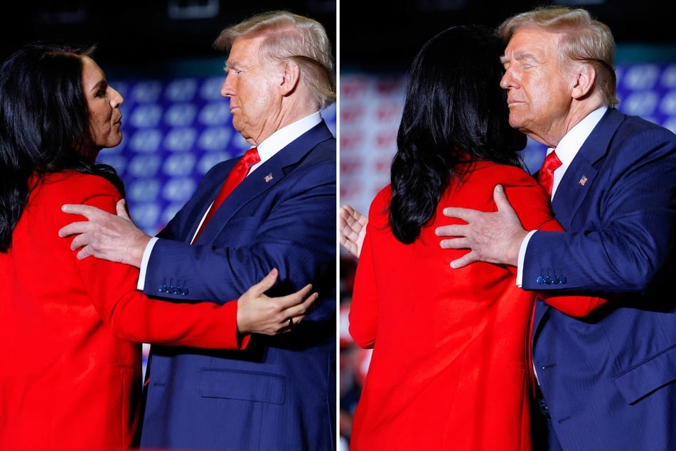 Former Congresswoman Tulsi Gabbard and Donald Trump embrace during a campaign rally at the Greensboro Coliseum in Greensboro, North Carolina on October 22, 2024.