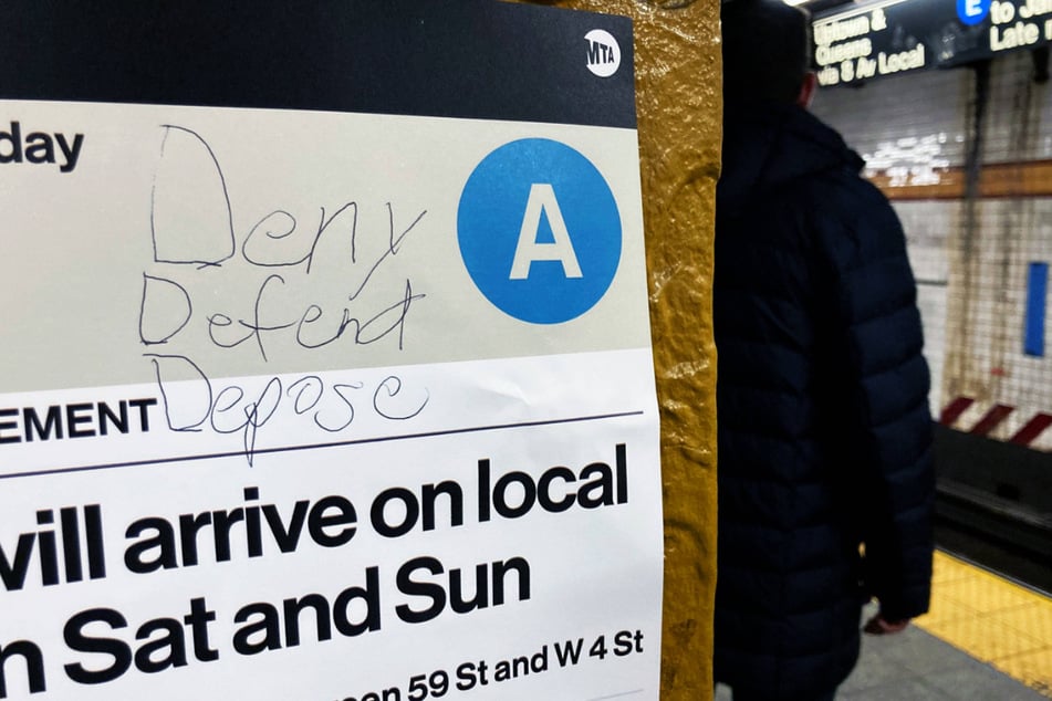 Grafitti that says "DENY DEFEND DEPOSE" – in reference to the messages inscribed on the bullet casings left behind by the shooter of Brian Thompson – was found on the New York subway.