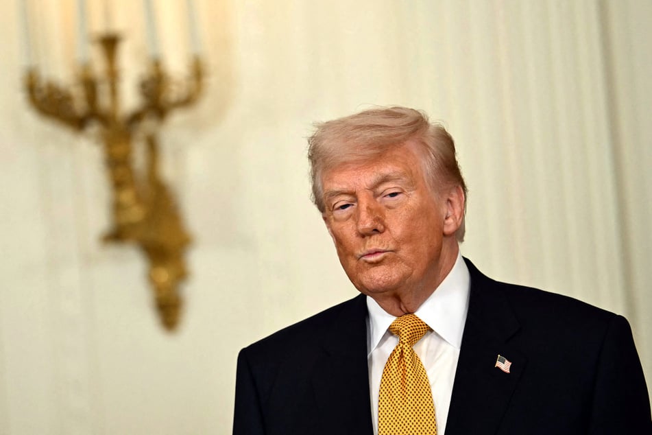 President Donald Trump participates in a Military Mother's Day Event in the East Room of the White House on Wednesday.