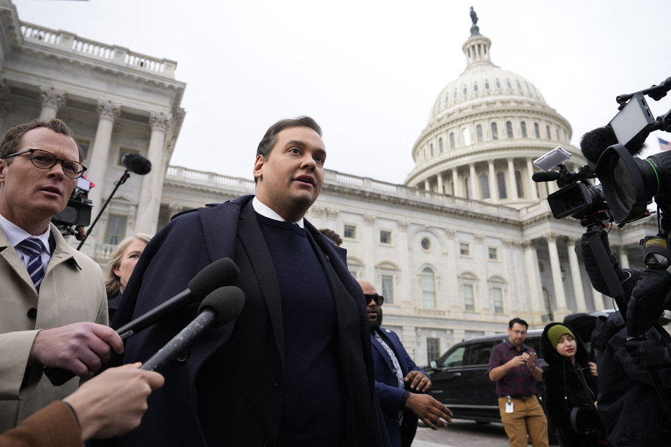 George Santos leaving the US Capitol after his colleagues in Congress voted to expel him from the House of Representatives on December 01, 2023.