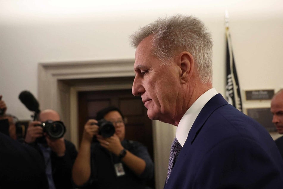 Ousted Speaker of the House Kevin McCarthy leaves a House Republican conference meeting on Capitol Hill on Tuesday as the Republican Party remains divided.