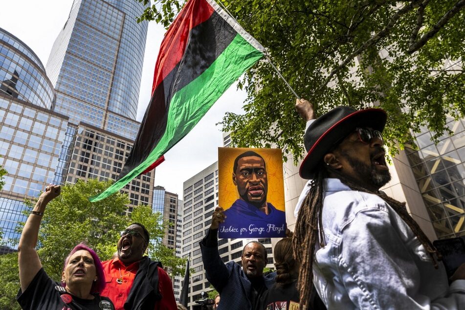 People rally outside the Hennepin County Government Center in Minneapolis, Minnesota, on June 25, 2021, as Derek Chauvin is sentenced to 22.5 years in prison.