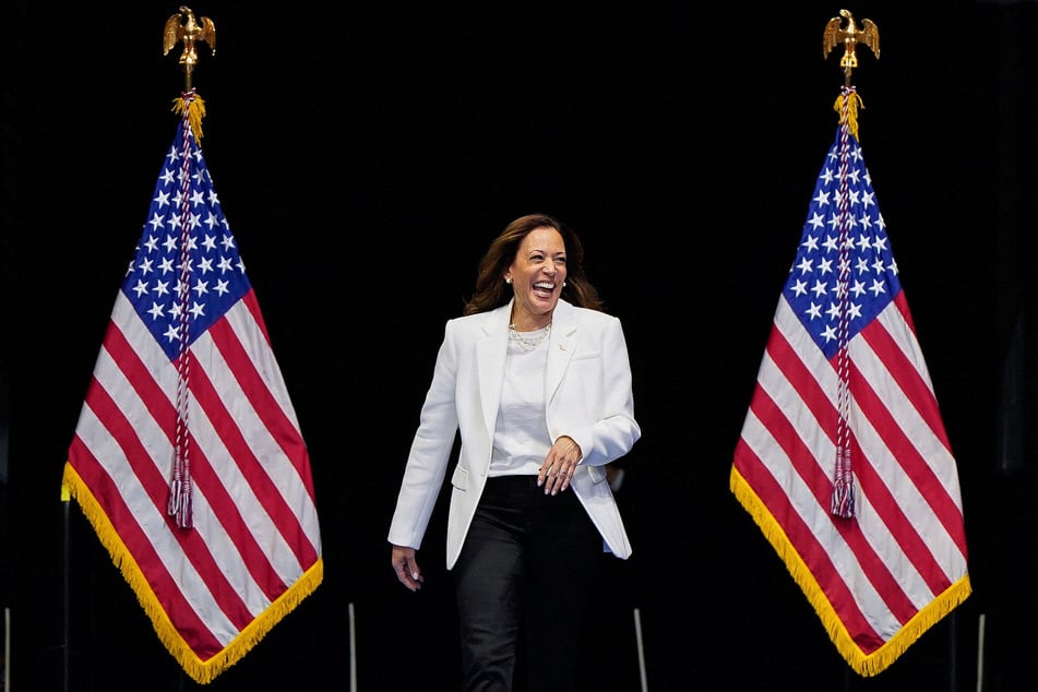 Democratic presidential nominee Kamala Harris enters the stage during a campaign rally in Savannah, Georgia.