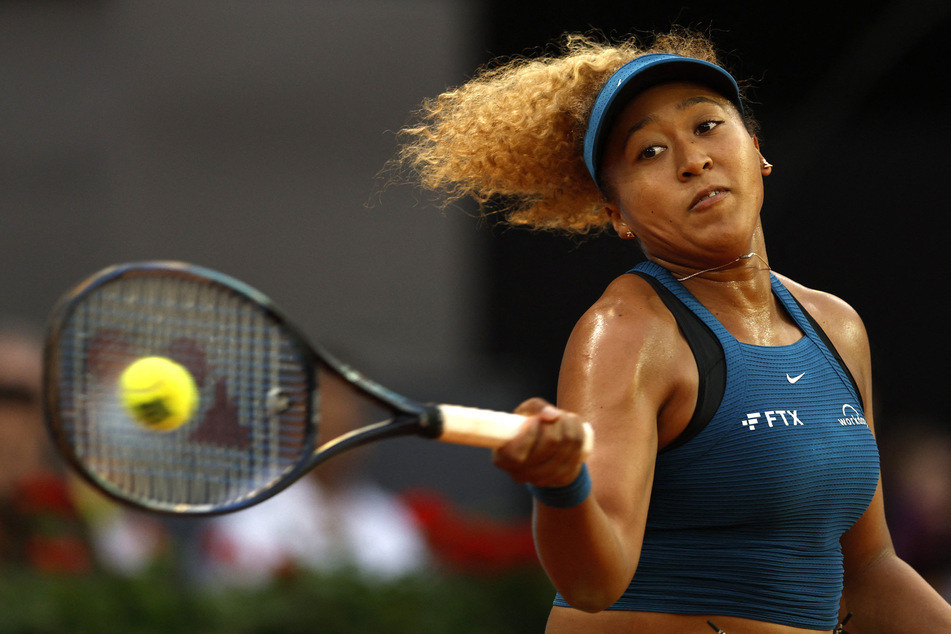Japan's Naomi Osaka in action during her second round match against Spain's Sara Sorribes at the 2022 Madrid Open.