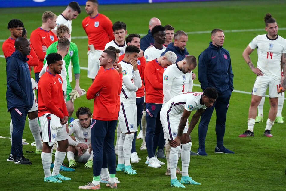 England's soccer team stands by gathering themselves after losing the UEFA Euro 2020 Final against Italy