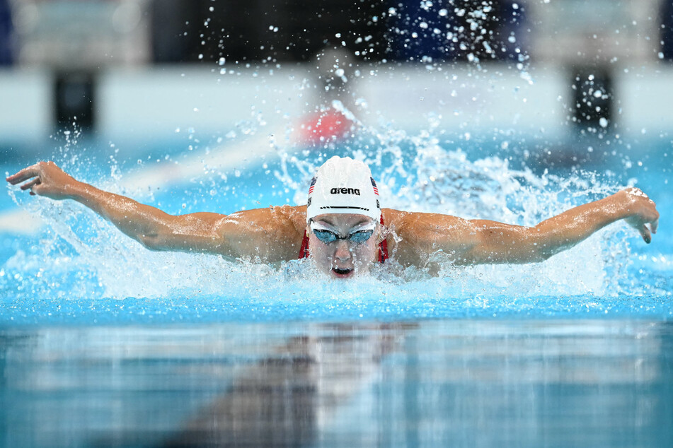 American world record holder Gretchen Walsh was fourth fastest into the women's 100m butterfly semi-finals in 56.75.