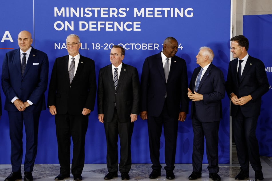 Defense ministers Guido Crosetto of Italy, Bill Blair of Canada, Boris Pistoriu of Germany, and Lloyd Austin of the US, along with European Union foreign policy chief Josep Borrell and NATO Secretary General Mark Rutte, pose for a group photo during the G7 Defense Ministers meeting in Naples, Italy, on October 19, 2024.