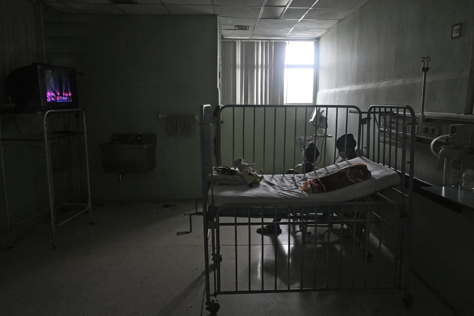 A woman cares for her child at the William Soler Pediatric Cardiocenter in Havana, Cuba, on March 24, 2026.