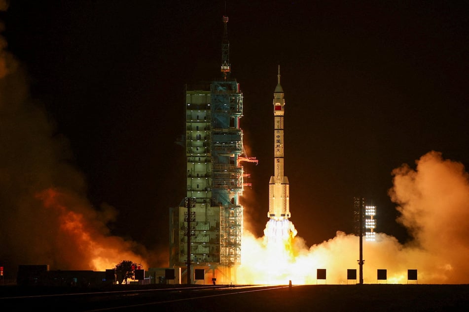 A Long March 2F rocket carrying the Shenzhou-23 spacecraft blasts off to China's Tiangong space station from the launchpad at the Jiuquan Satellite Launch Center, near Jiuquan, Gansu province, China, on May 24, 2026.