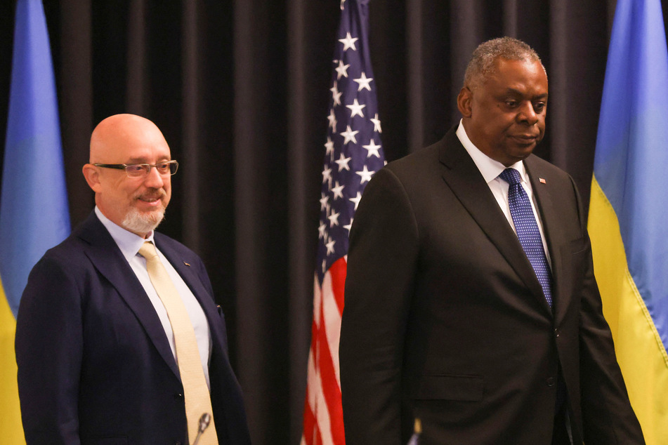 US Secretary of Defense Lloyd J. Austin and Ukraine's Defense Minister Oleksiy Reznikov arrive for a meeting of the Ukraine Defense Contact Group at the American military's Ramstein Air Base in Germany.