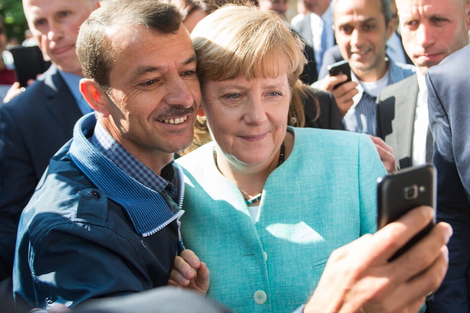 Einmal lächeln bitte: Mit einem Flüchtling entstand 2015 das berühmte Merkel-Selfie.
