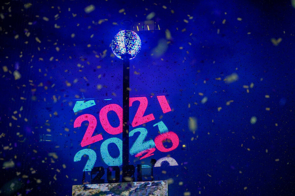 The New Year's Eve ball drops in a mostly empty Times Square in New York City to mark the start of 2021.