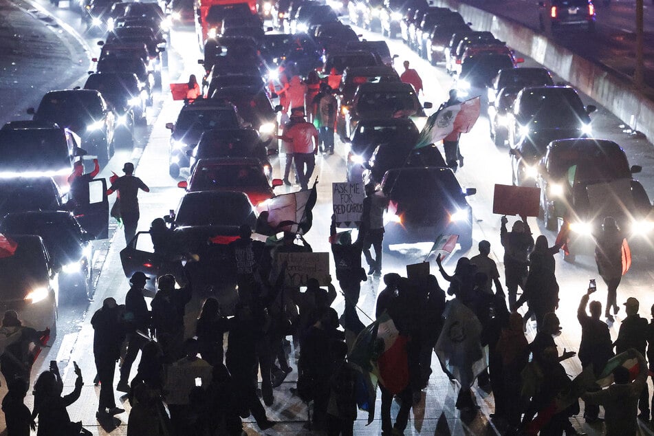 Thousands of demonstrators have blocked a major LA highway in protest of Trump's immigrant round-ups and deportations.