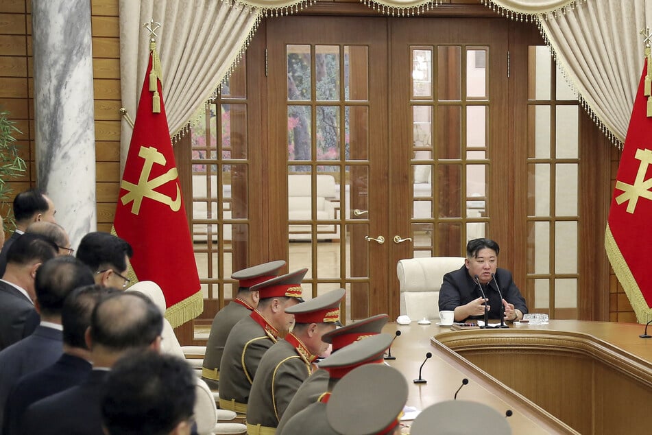 Kim Jong-un scraps North Korea's reunification aims and names "principal enemy"