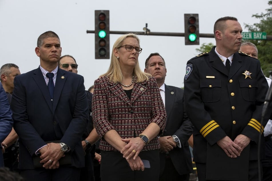 Highland Park Mayor Nancy Rotering (c.) said she was the suspect's Cub Scout leader when he was a boy.