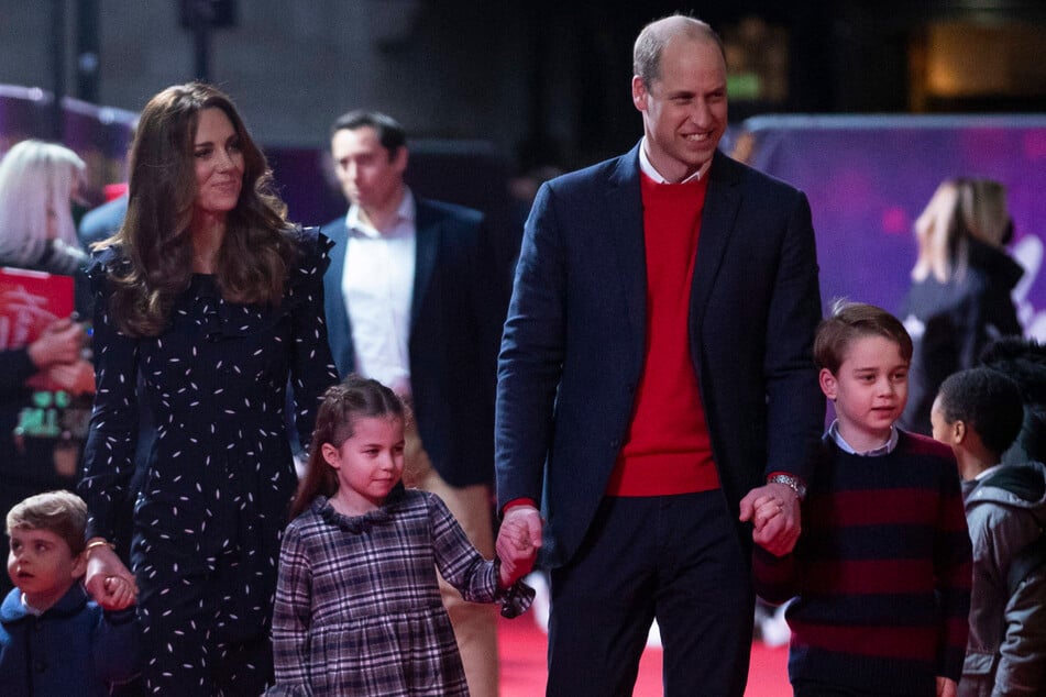 From l. to r.: Prince Louis, Duchess Kate, Princess Charlotte, Prince William, and Prince George arrive to attend a special pantomime performance at London's Palladium Theater.