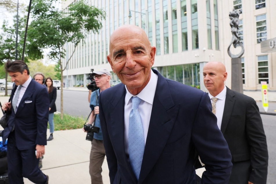 Tom Barrack leaves US District Court for the Eastern District of New York in a short recess during jury selection for his trial.