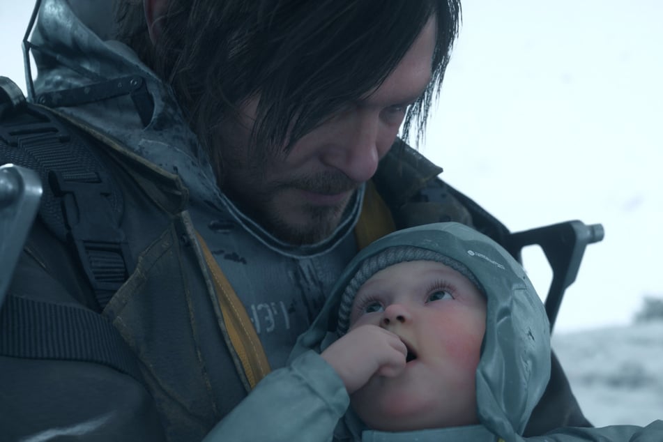 Sam Porter, gespielt von Norman Reedus (56), mit Kind Lou. Warum er mit dem kleinen Spross unterwegs ist, würde hier jeglichen Textrahmen sprengen.